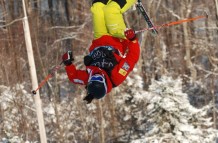 Big air off the second jump in the mogul run on competition day